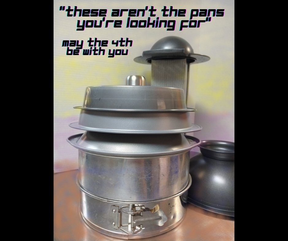 Image of baking pans stacked to look like a building seen in a Star Wars movie. Text reads "these aren't the pans you're looking for, May the 4th be with you"